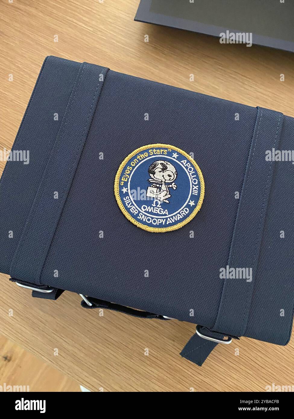 Omega watch, 50th anniversary 'eyes on the stars' silver snoopy award tribute to the award Omega received in 1970 from NASA astronauts for Apollo 13 - Smartphone Captured Stock Image