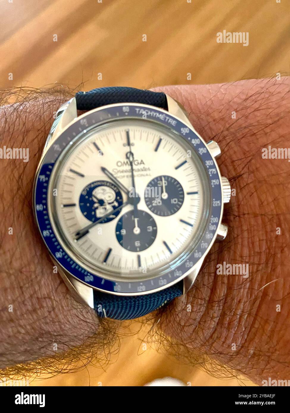 Omega watch, 50th anniversary 'eyes on the stars' silver snoopy award tribute to the award Omega received in 1970 from NASA astronauts for Apollo 13 - Smartphone Captured Stock Image