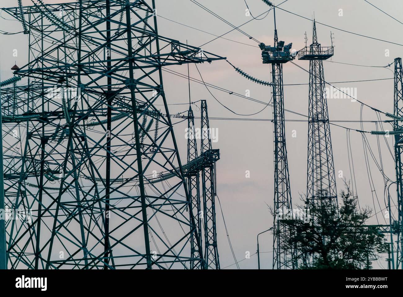Power Lines and Towers Against a Cloudy Sky Stock Photo - Alamy