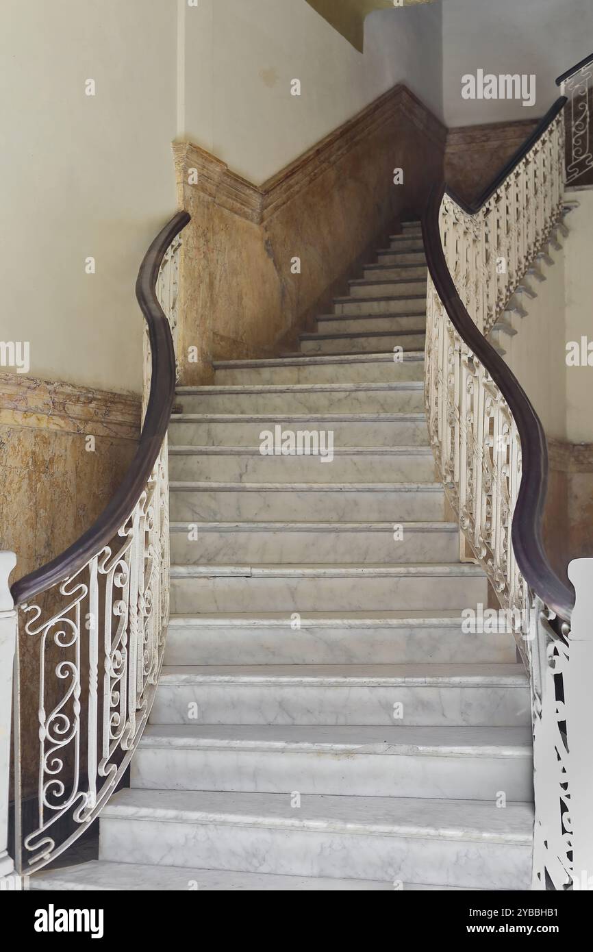 Stately Step Havana, Cuba-October 28, 2019: Stately staircase with cast-iron railing ...