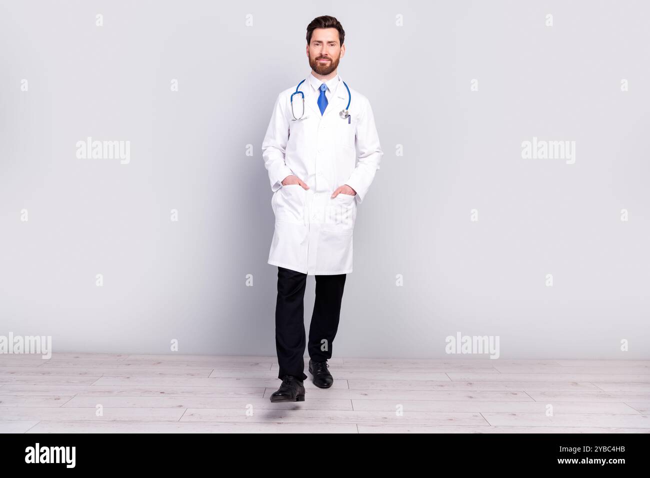 Full size photo of professional qualified doctor walk wear white coat ...
