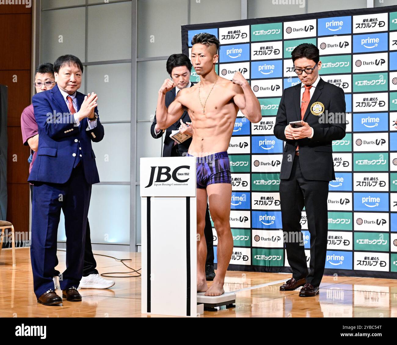 Tokyo, Japan. 12th Oct, 2024. Japan's Takuma Inoue poses on the scale ...
