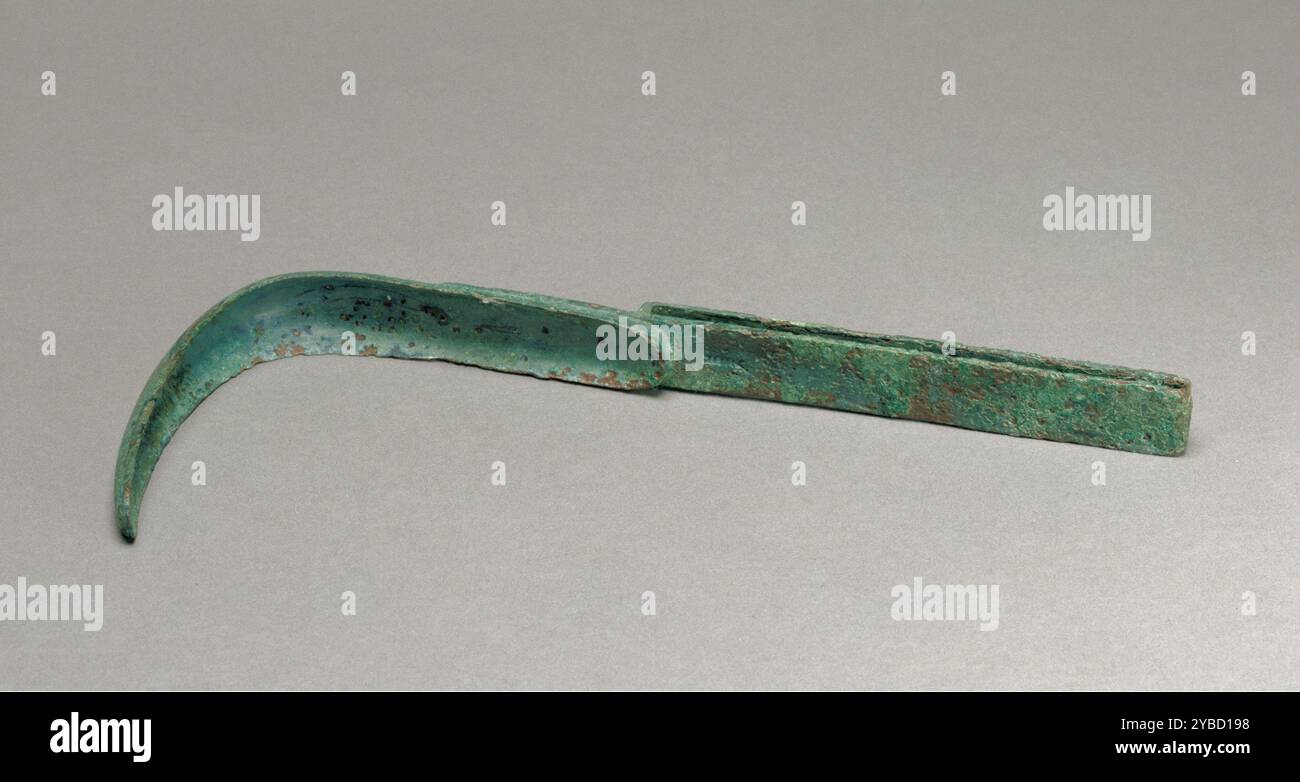 Strigil, about A.D. 100.  Additional Info: Soap was used for laundry and medicinal purposes in the ancient world, but it was not normally used for bathing until the late 200s A.D. Until then the Romans, like the Greeks before them, cleaned themselves by rubbing the body with oil and an abrasive, like fine sand or ground pumice. They then used a strigil, usually made of bronze, to scrape off the oil and dirt. The curved blade of the strigil fit the shape of the body and its concave form channeled away the oily sludge. Although both men and women used strigils in the baths, they are most strongl Stock Photo