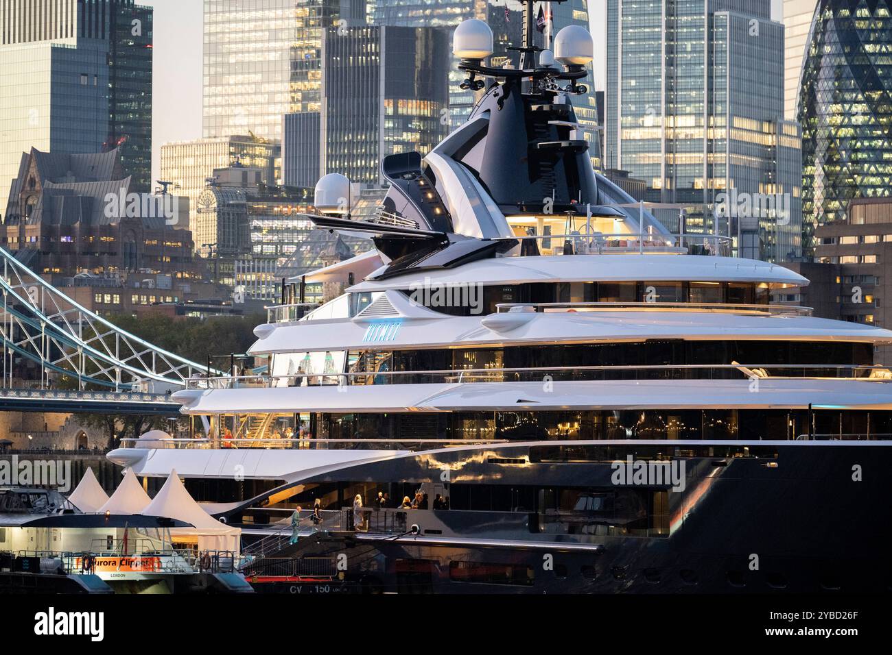 the-superyacht-kismet-is-seen-infront-of-tower-bridge-and-skyscrapers