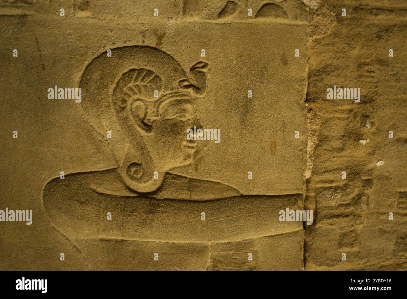 Hathor Temple, Dendera, Egypt. Relief depicting the god Ihy probably ...
