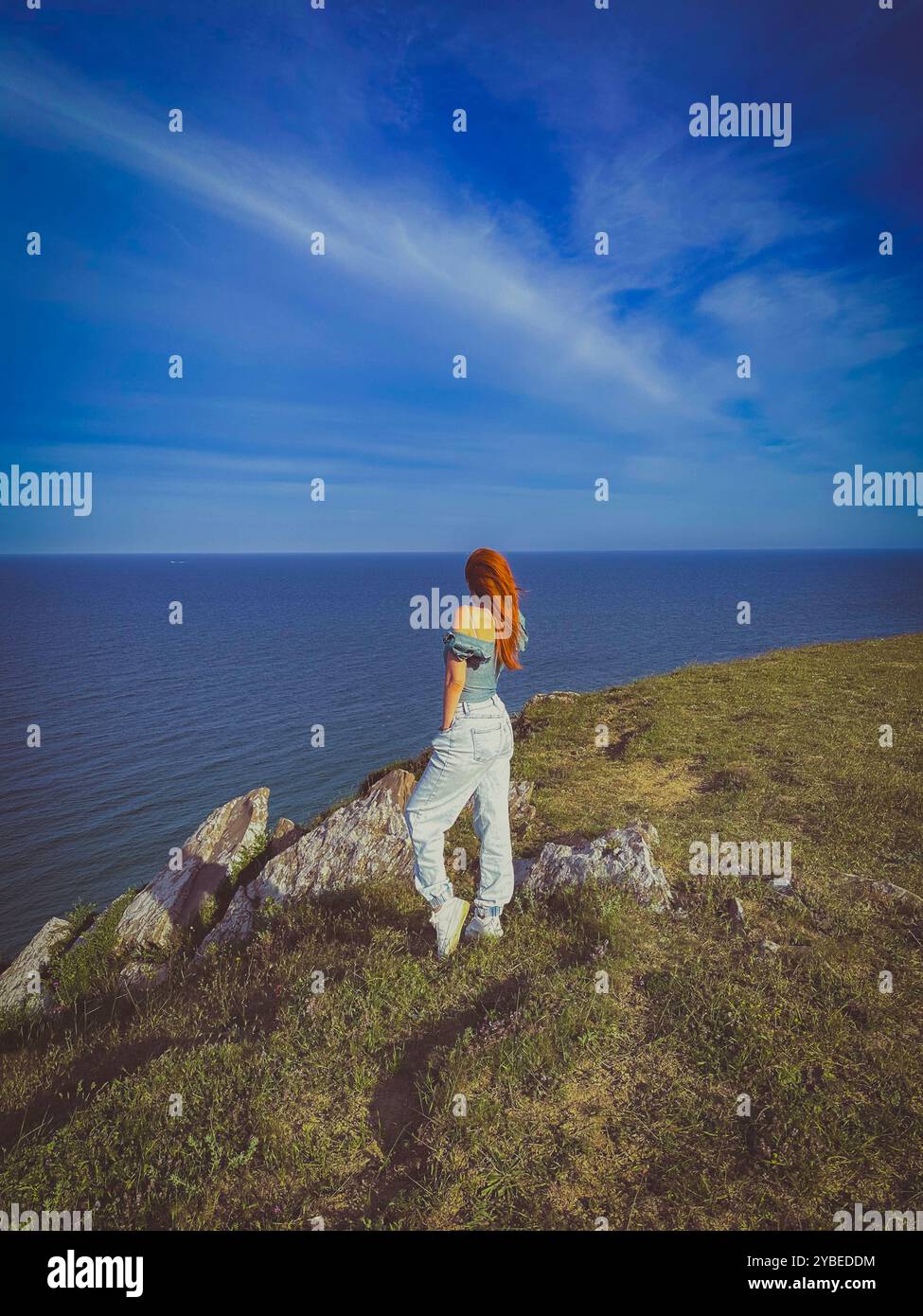 The girl and sea - Smartphone Captured Stock Image