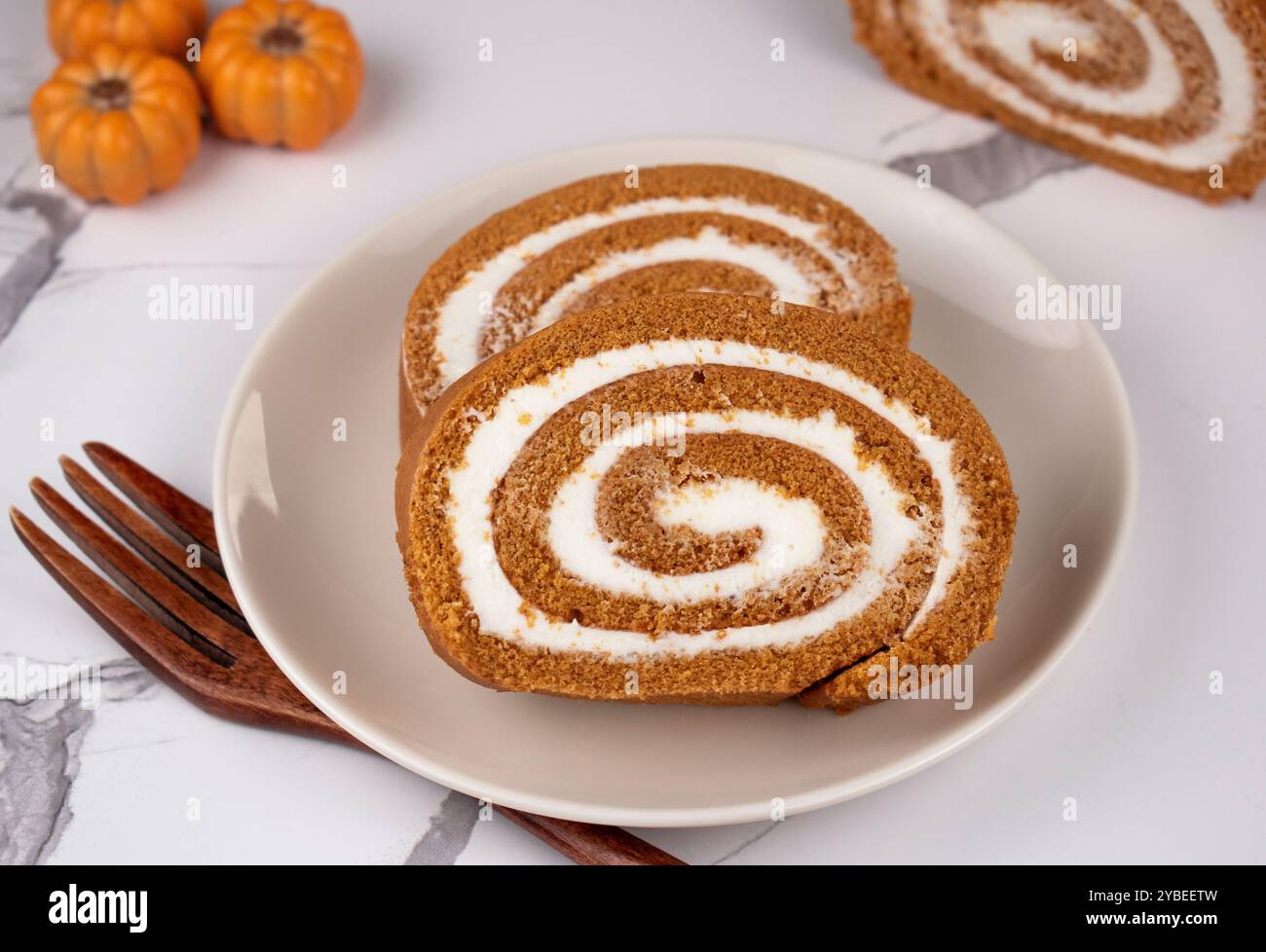 Pumpkin Swiss Roll being served Stock Photo