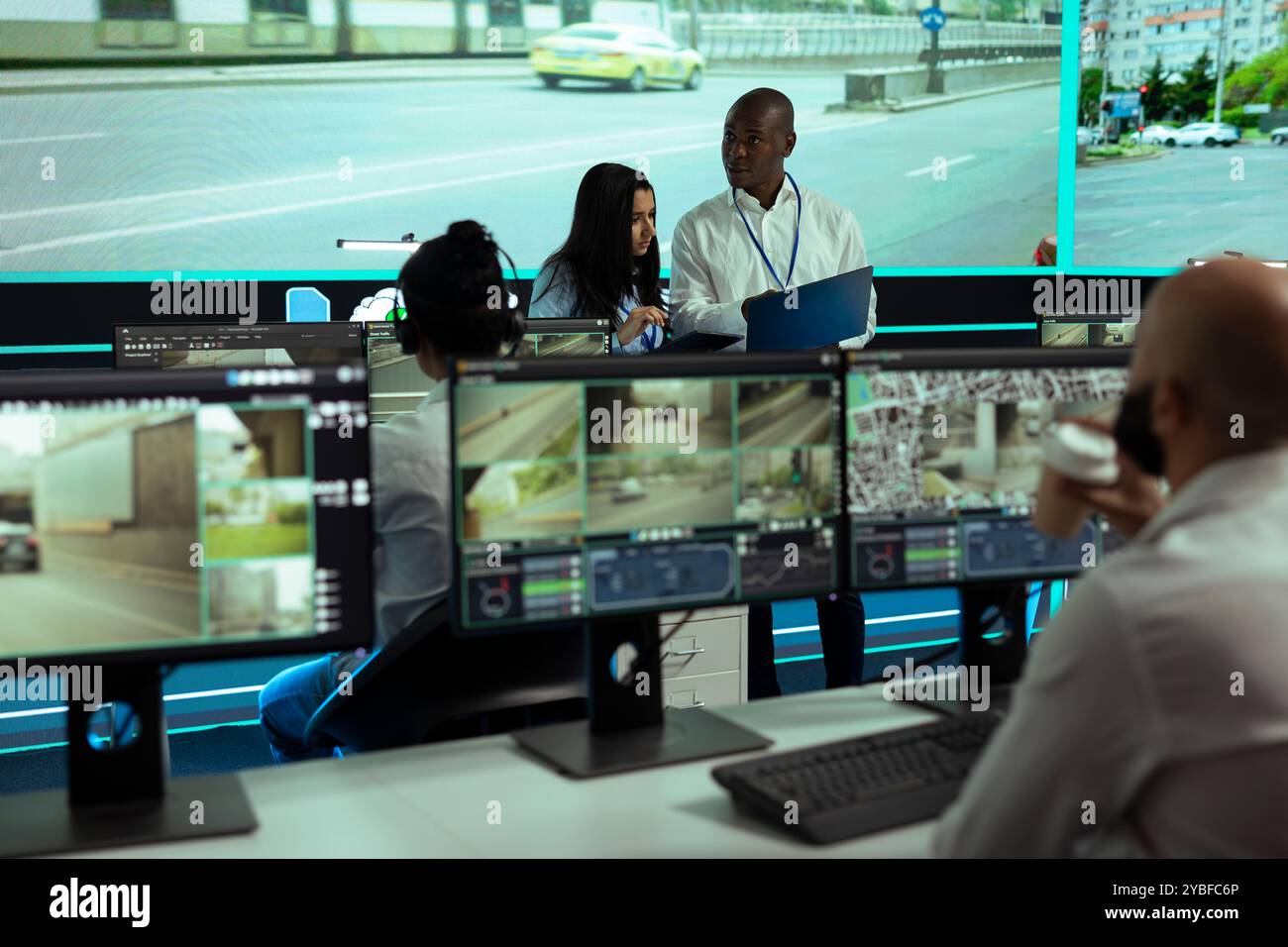 Indian manager working with her staff to gather intelligence by ...