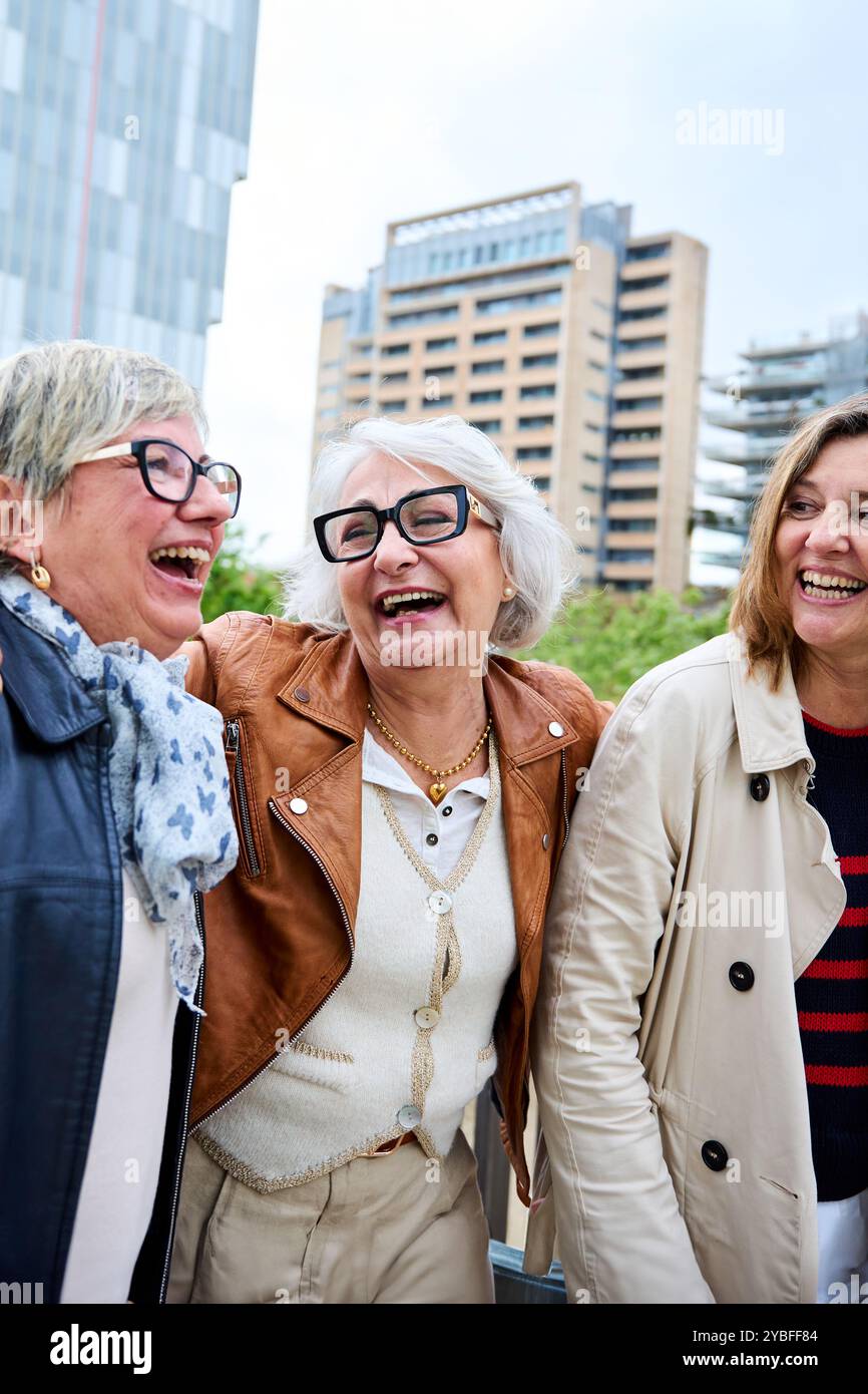 Mature women friends walking hi-res stock photography and images - Alamy