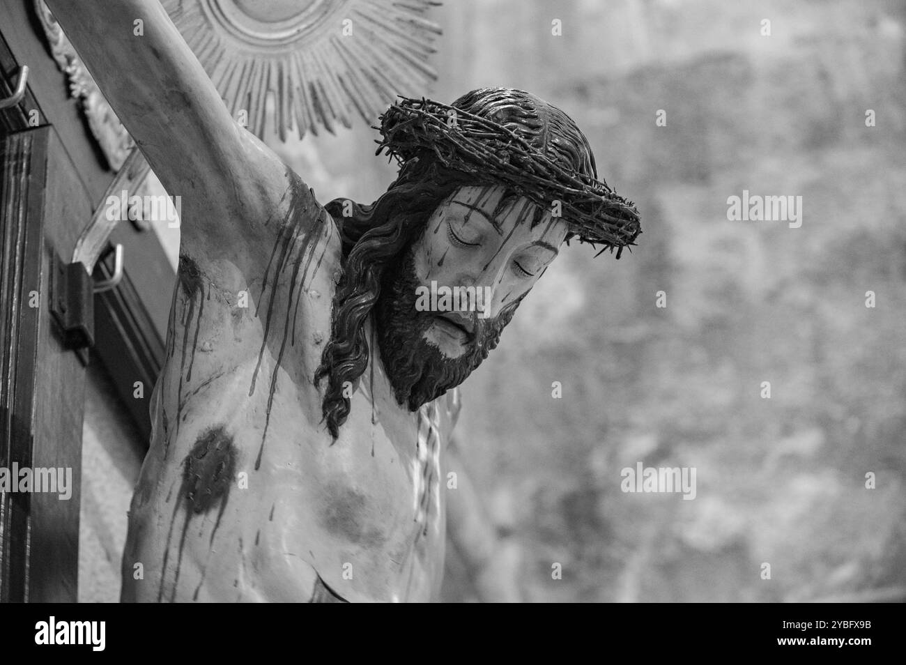 Jesus on the Cross. The Cathedral of Saint Mary Major (Sé de Lisboa) in Lisbon, Portugal. Stock Photo