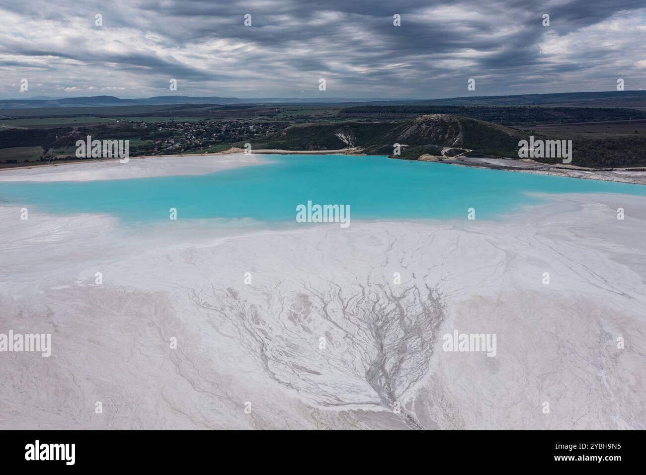 Aerial view of a tailings pond for waste from a chemical plant near to ...