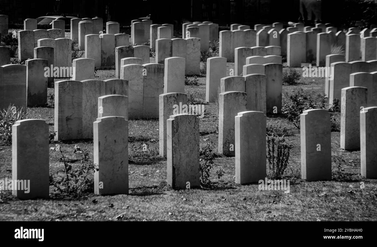 Black and white pictures of rows of graveyard stones Stock Photo