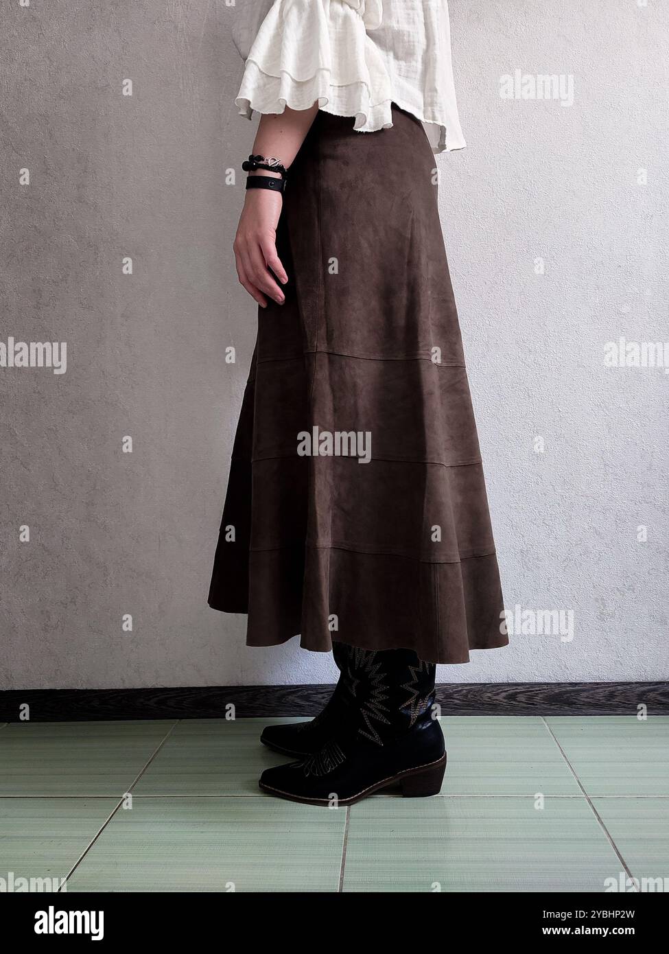 Retro Outfit, Vintage Genuine Fine Suede Leather Skirt, Cowboy Cossack Boots, White Bohemian Blouse, Front View, Outfit Details, Anonymous Woman, Brown A Line Boho Patchwork Midi Skirt, Coffee Skirt - Smartphone Captured Stock Image