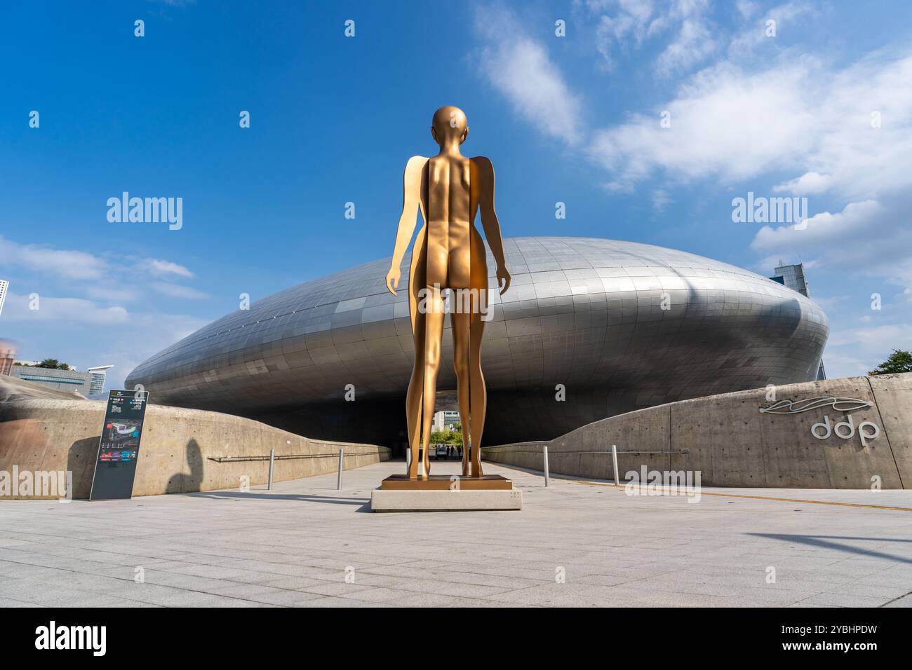 Seoul, South Korea - 10 October 2024 -View of the statue The Birth of a Heroine in front of the famous building of Dongdaemun Design Plaza or known as Stock Photo