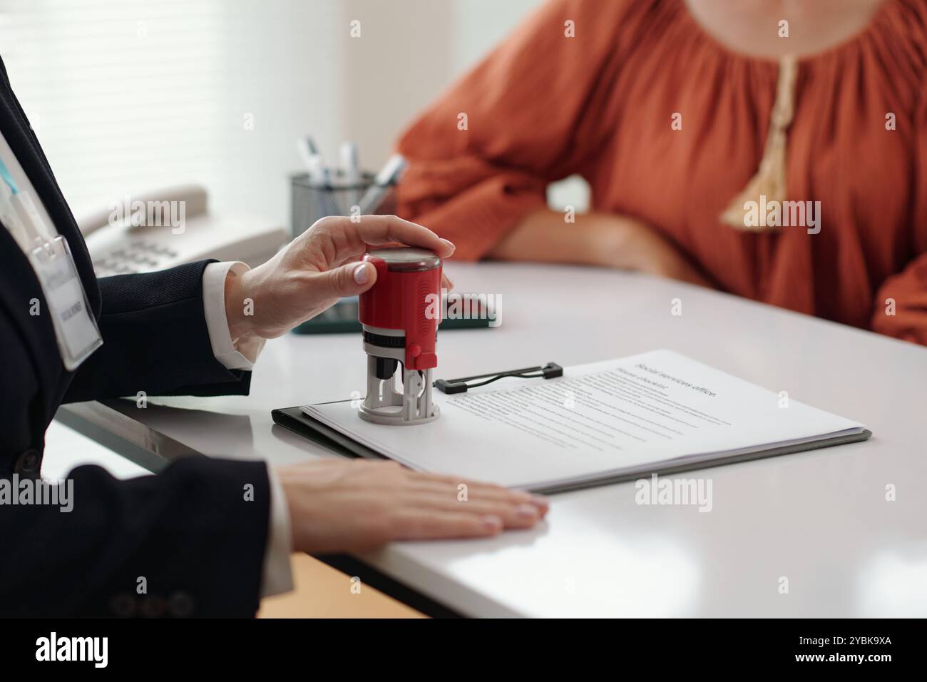 Social worker approving agreement hi-res stock photography and images ...