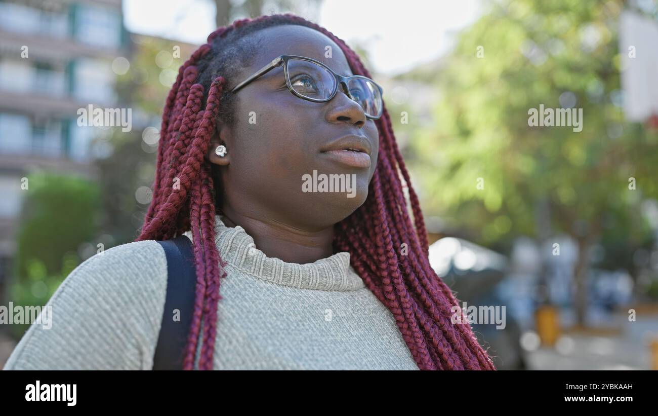 Woman wearing glasses braids hi-res stock photography and images - Alamy
