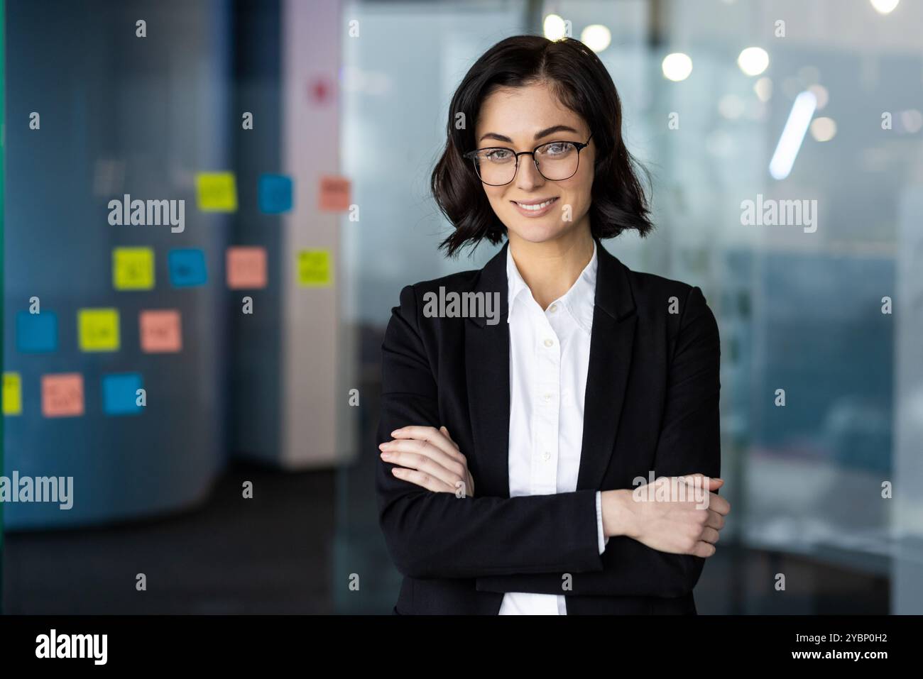 Businesswoman in black blazer hi-res stock photography and images - Alamy