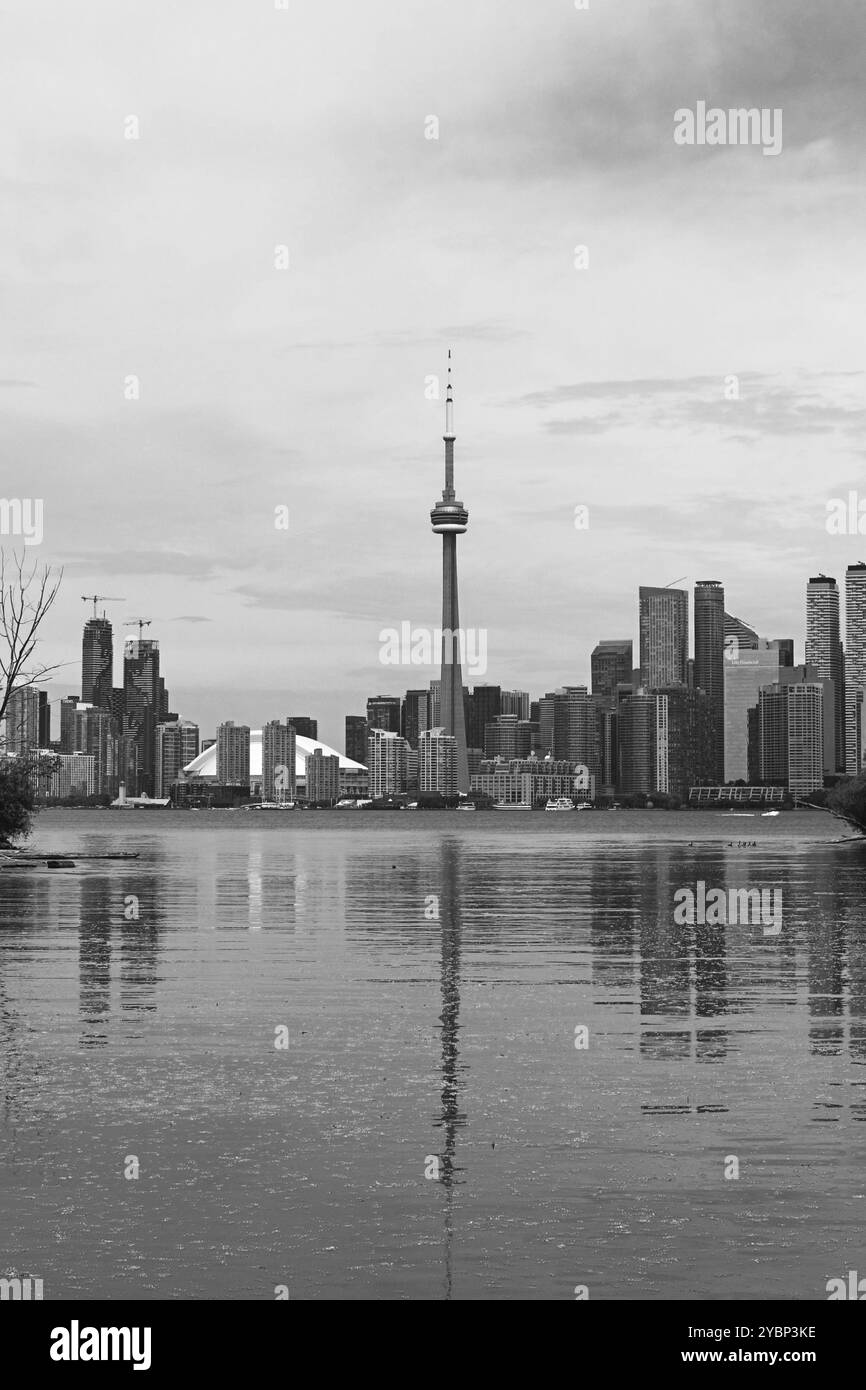 Toronto, ON, Canada - June 13th 2024: View across Lake Ontario from the Toronto Islands of the Toronto skyline including the CN Tower in the centre. Stock Photo
