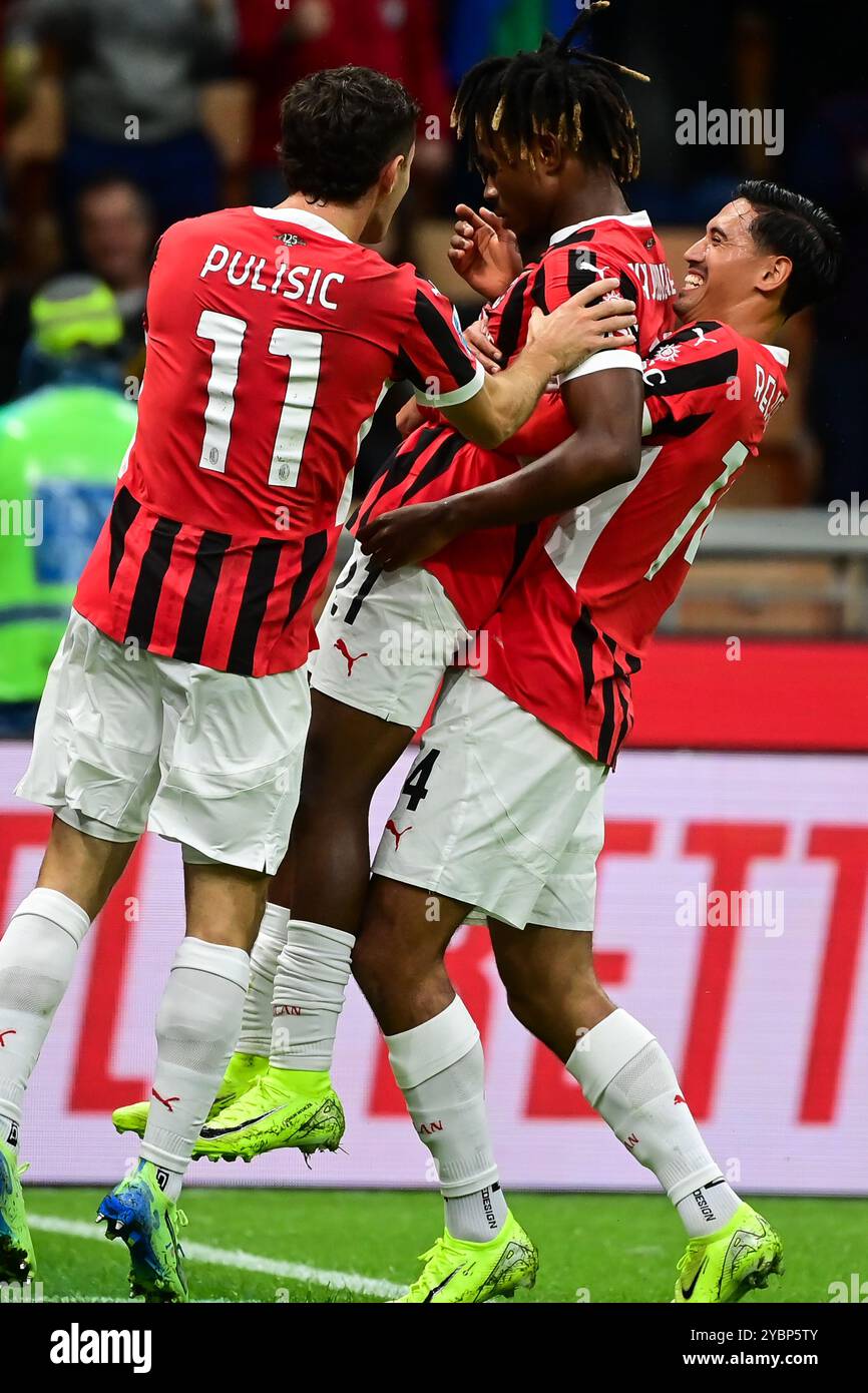 Milan, Italy on October 19, 2024. AC Milan's Nigerian midfielder #21 Samuel Chukwueze celebrates after scoring his team first goal during the Italian Serie A football match between AC Milan and Udinese at San Siro Stadium in Milan, Italy on October 19, 2024 Credit: Piero Cruciatti/Alamy Live News Stock Photo