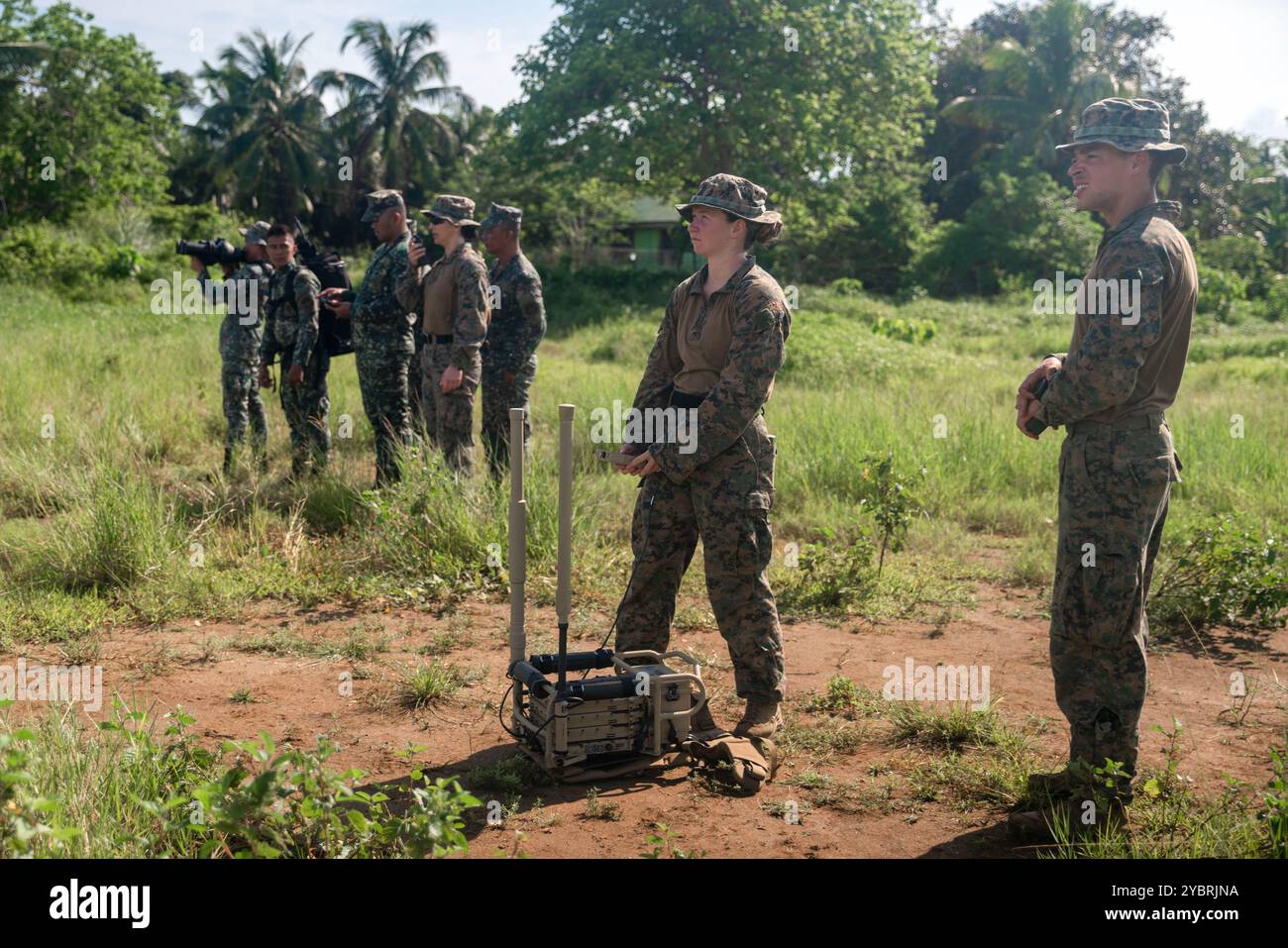 U.S. Marines, right, assigned to the 15th Marine Expeditionary Unit ...