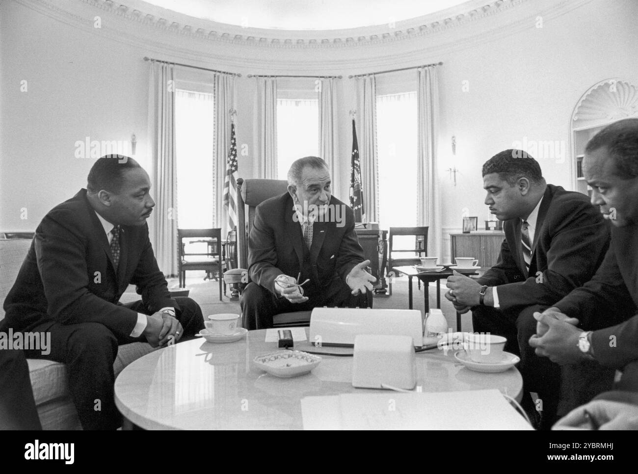 President Lyndon B. Johnson (center) meets with (from left to right) Martin Luther King, Jr., Whitney Young, James Farmer in the Oval Office of the White House, January 18, 1964. Photo by Yoichi Okamoto. Lyndon Baines Johnson Library and Museum / NARA  More information here: https://en.wikipedia.org/wiki/Lyndon B. Johnson#Civil rights https://en.wikipedia.org/wiki/Martin Luther King Jr. https://en.wikipedia.org/wiki/Whitney Young https://en.wikipedia.org/wiki/James Farmer Stock Photo