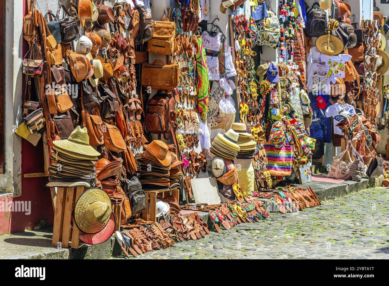 Traditional trade of typical products, souvenirs and gifts of various types in the streets and sidewalks of Pelourinho in the city of Salvador, Bahia Stock Photo