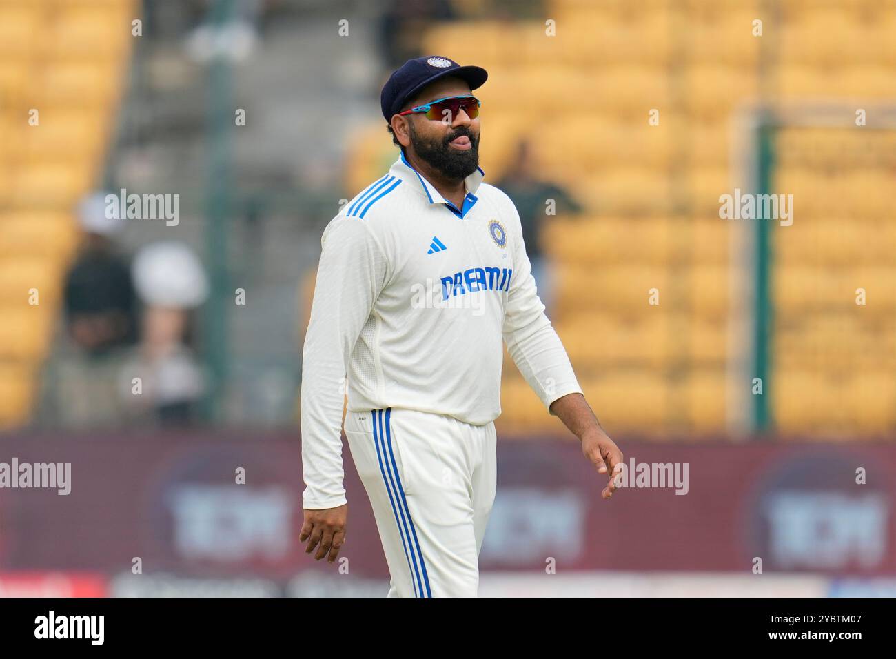 India's captain Rohit Sharma reacts as he leaves the field after their ...