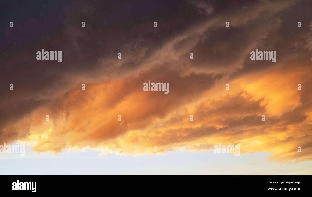 Dramatic clouds at sunset Stock Photo
