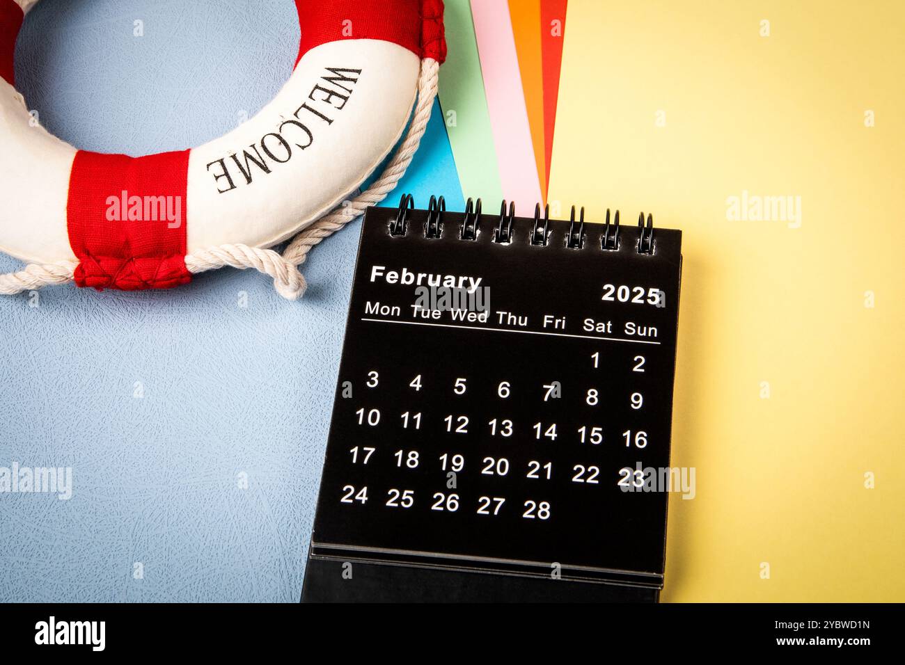 FEBRUARY 2025. Monthly desk calendar for 2025 year. Colorful sheets of ...