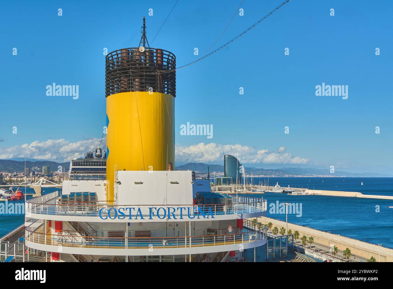 Barcelona. Espain -October 20,2024: Image of the Costa Fortuna cruise ship docked at Barcelona port, with the city in the background. Perfect to repre Stock Photo