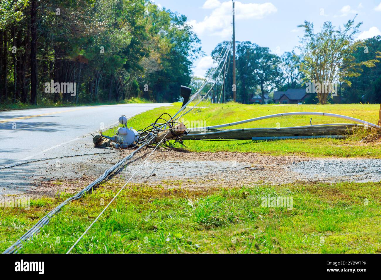 Tornado damage caused by hurricanes leads to damaged power lines lying ...