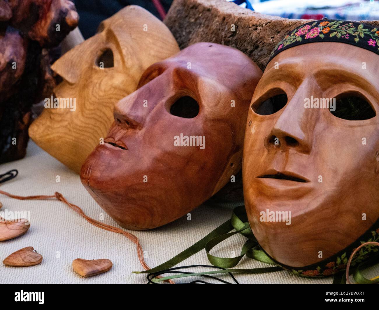 Display of wooden masks in a market in Sardinia, Italy, during the ...
