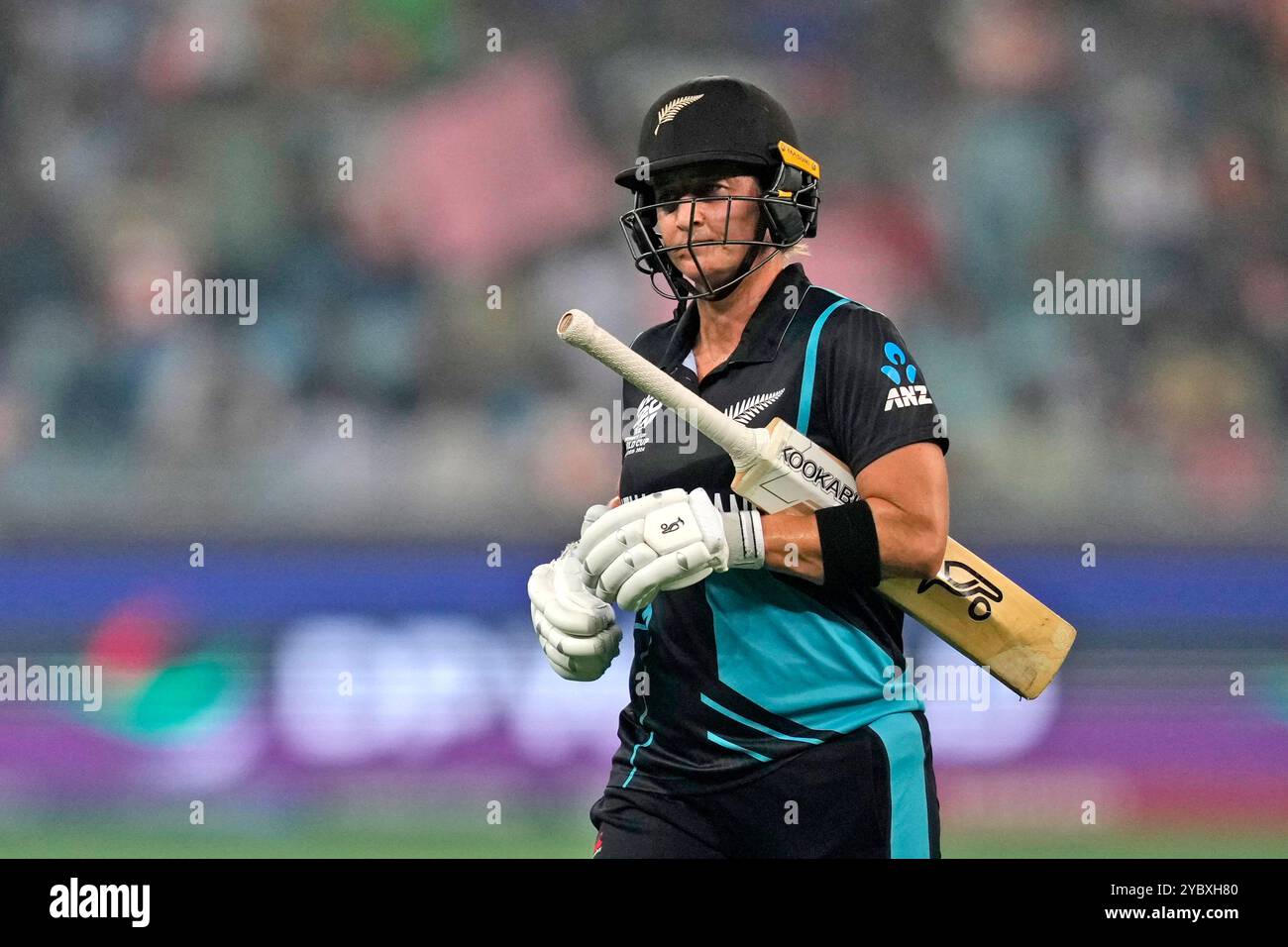 New Zealand's captain Sophie Devine leaves the field after losing her ...