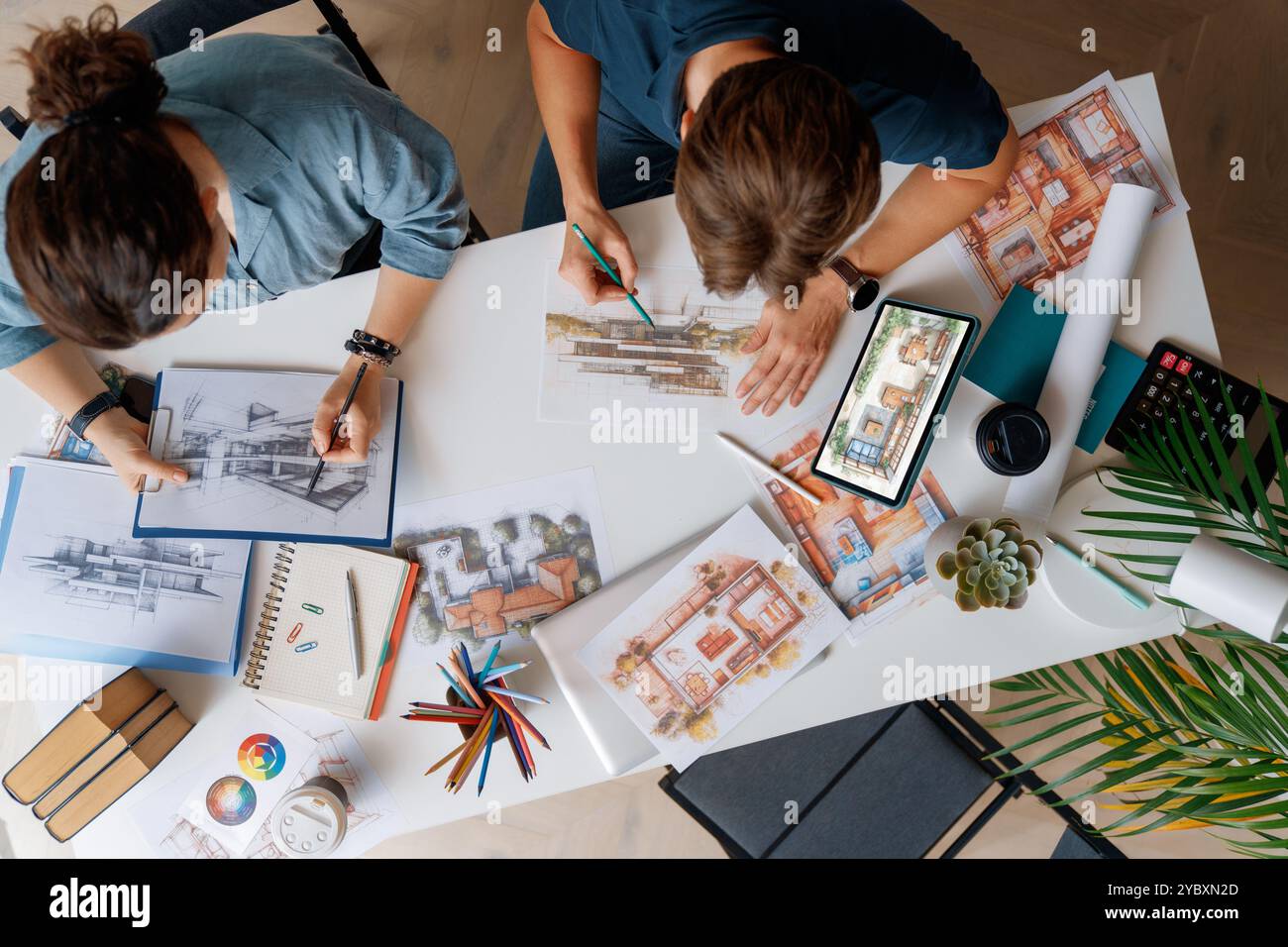 Designers working in studio and using sketches. Stock Photo