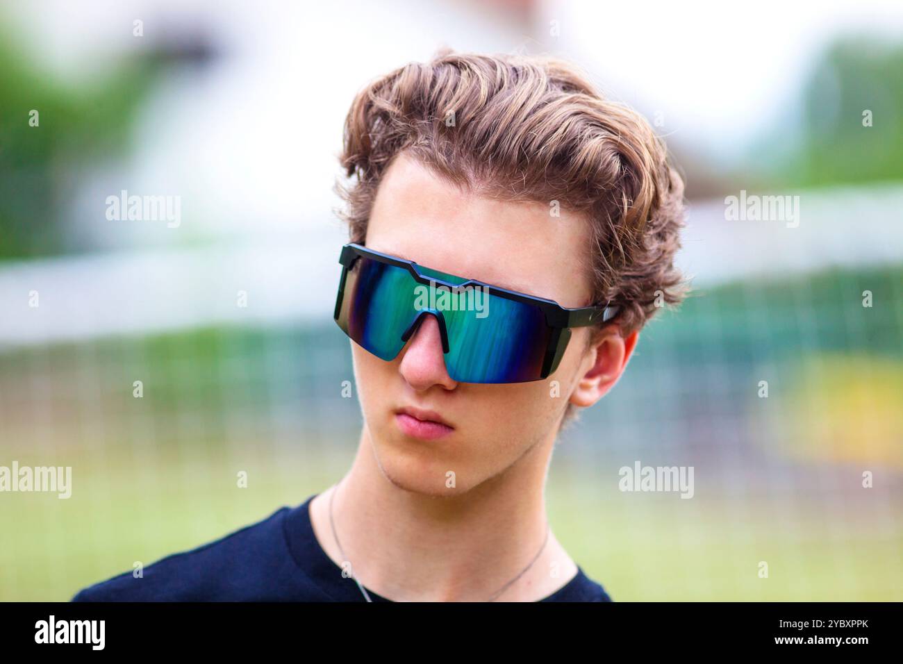 Outdoor portrait of a teenage boy Stock Photo - Alamy