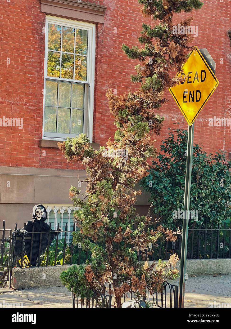 Dead End sign and ghos halloween decoration in Brooklyn, New York - Smartphone Captured Stock Image