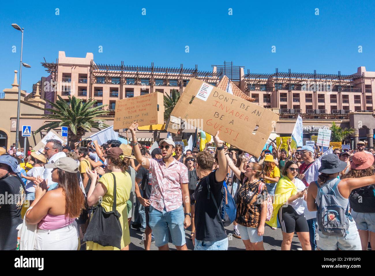 Gran Canaria, Canary Islands, Spain, 20th October 2024. A coordinated protest by thousands of locals across all the Canary Islands calling for a freeze on tourist numbers and a more sustainable tourism policy. PICTURED: Thousands of protesters march outside hotels in Maspalomas resort on Gran Canaria Credit: Alan Dawson/Alamy Live News. Stock Photo