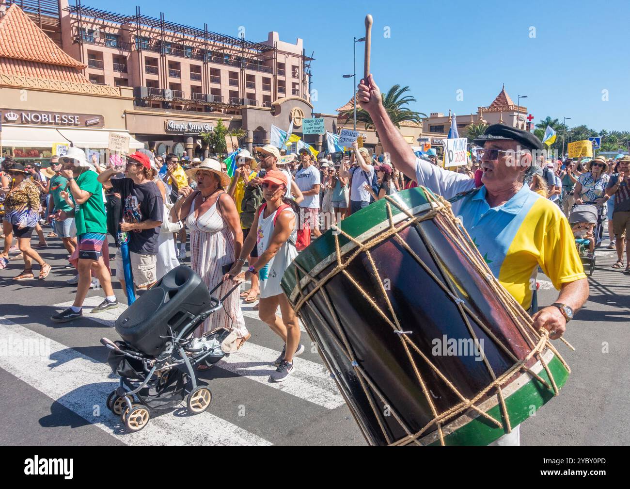 Gran Canaria, Canary Islands, Spain, 20th October 2024. A coordinated protest by thousands of locals across all the Canary Islands calling for a freeze on tourist numbers and a more sustainable tourism policy. PICTURED: Thousands of protesters march outside hotels in Maspalomas resort on Gran Canaria Credit: Alan Dawson/Alamy Live News. Stock Photo