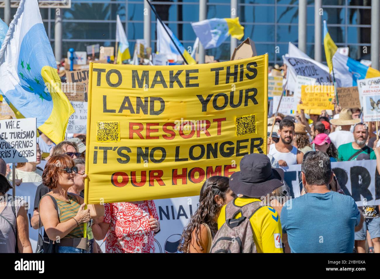 Gran Canaria, Canary Islands, Spain, 20th October 2024. A coordinated protest by thousands of locals across all the Canary Islands calling for a freeze on tourist numbers and a more sustainable tourism policy. PICTURED: Thousands of protesters march outside hotels in Maspalomas resort on Gran Canaria Credit: Alan Dawson/Alamy Live News. Stock Photo