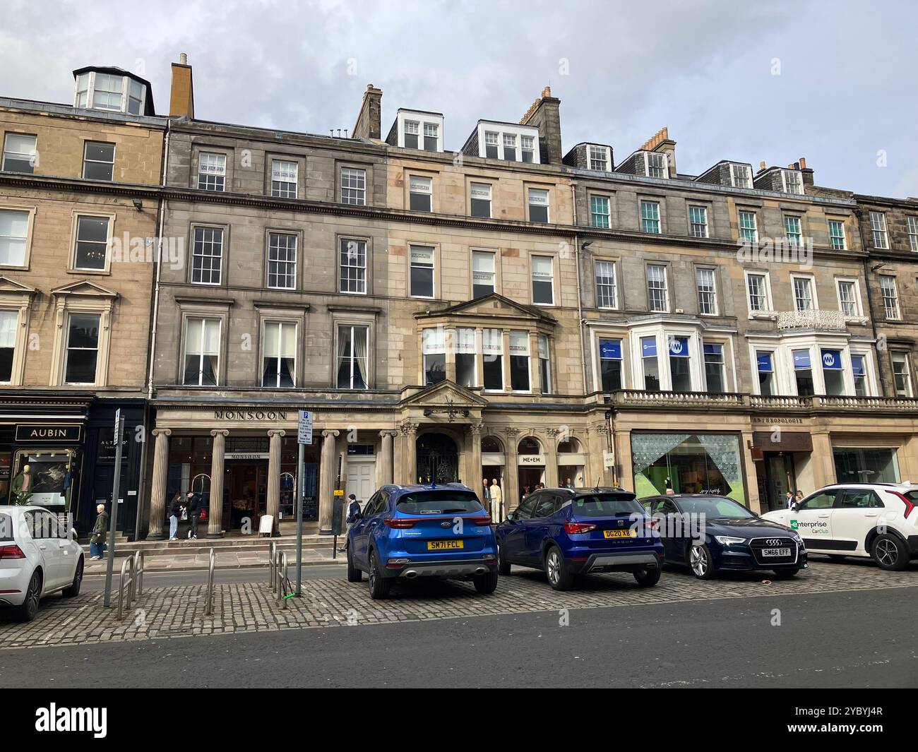 Shops on George Street. Edinburgh New Town, Edinburgh, Scotland, United Kingdom. 16th March 2024. - Smartphone Captured Stock Image