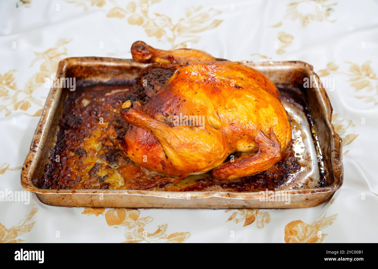 Rustic roast chicken stuffed with farofa Stock Photo - Alamy