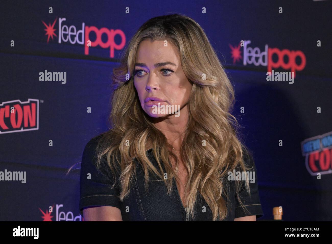 Denise Richards attends 'The Cast of Starship Troopers' panel on Day 1