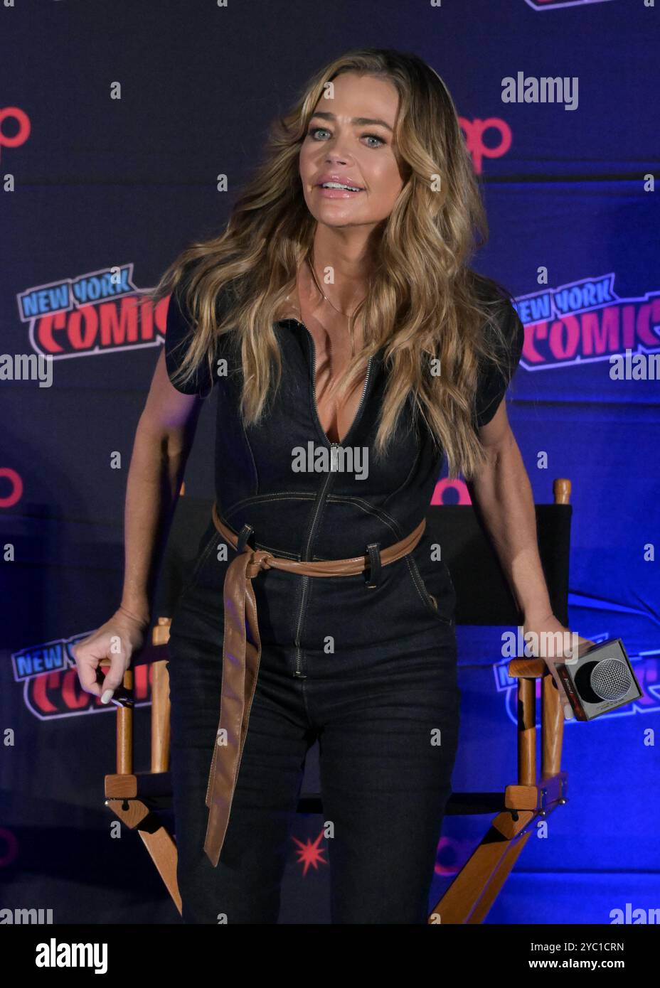 Denise Richards attends 'The Cast of Starship Troopers' panel on Day 1