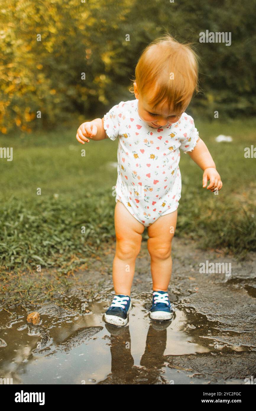 Kid splashing hi-res stock photography and images - Alamy