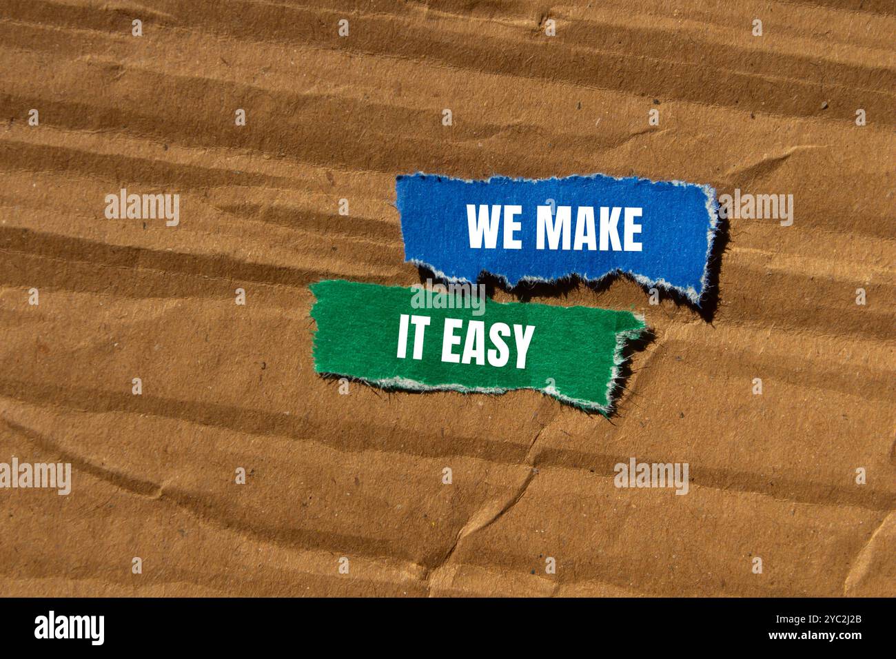 We make it easy message written on ripped torn paper pieces with ...