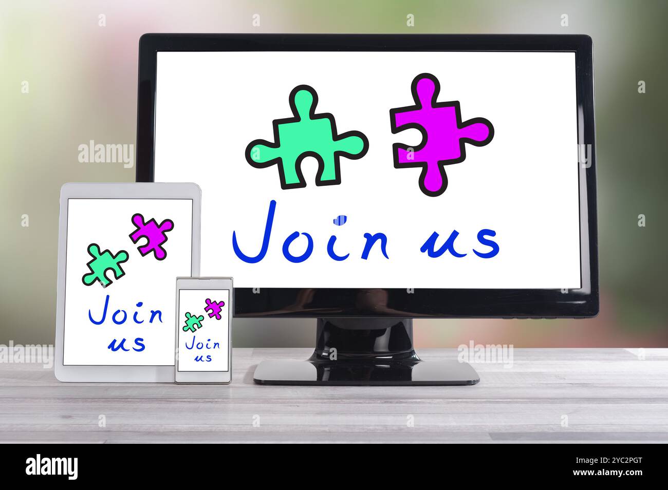Cooperation concept shown on different information technology devices Stock Photo