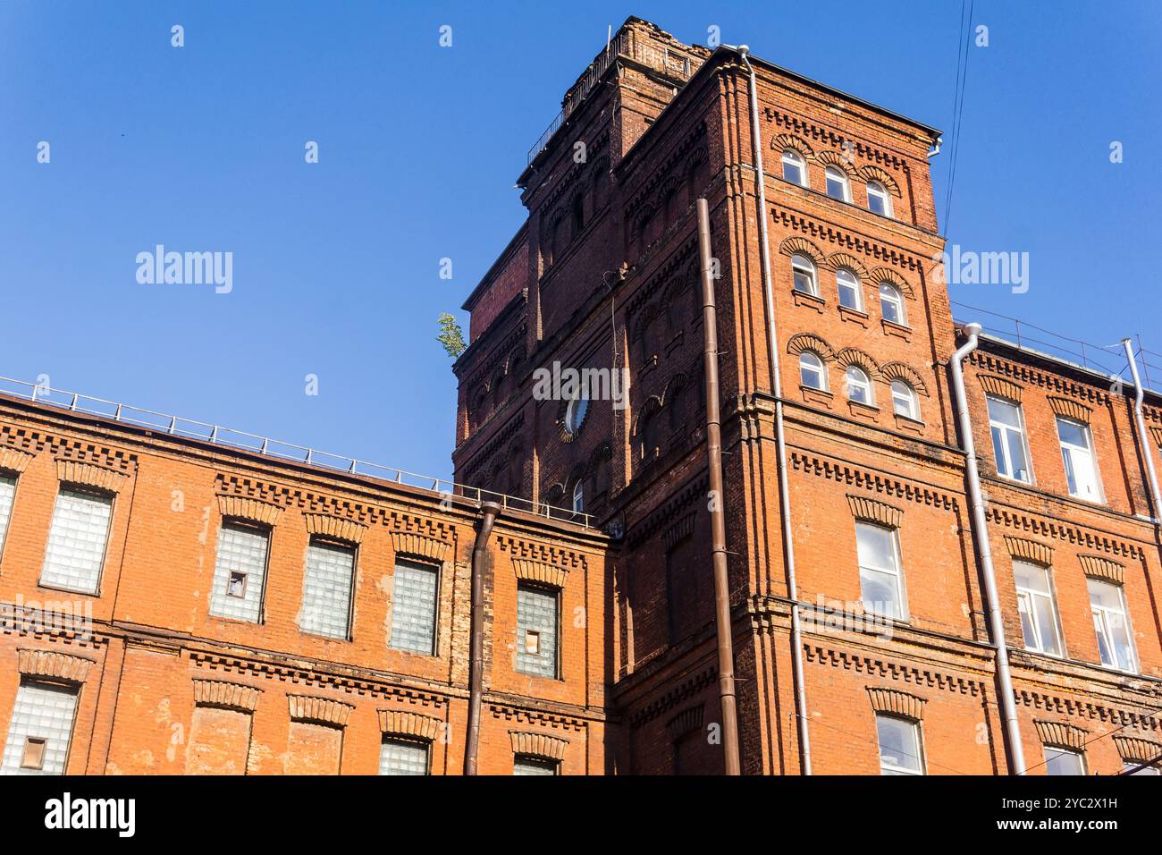 industrial architectural background, vintage factory building against a ...