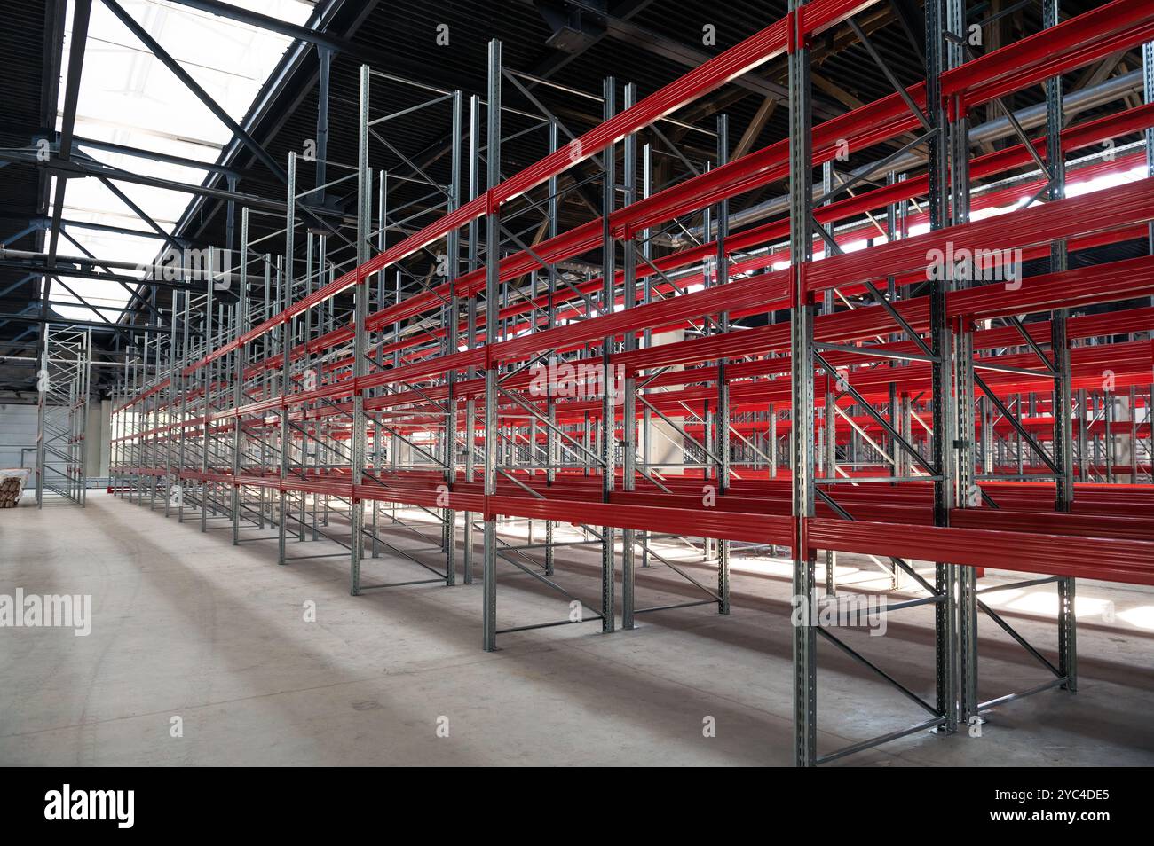 Logistics warehouse concept with empty high pallet racks, shelving ...