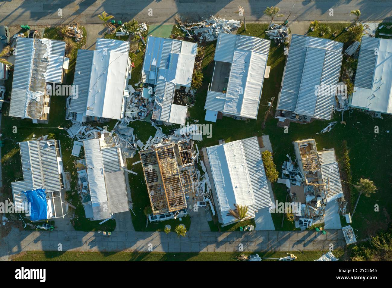 Severely damaged houses after hurricane Ian in Florida mobile home ...