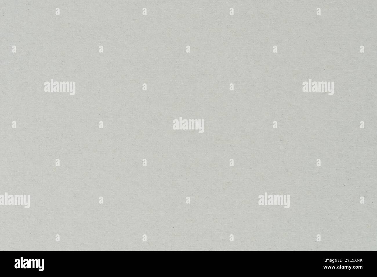 Neutral-toned surface features  light texture, illuminated gently in  minimalistic environment. Stock Photo